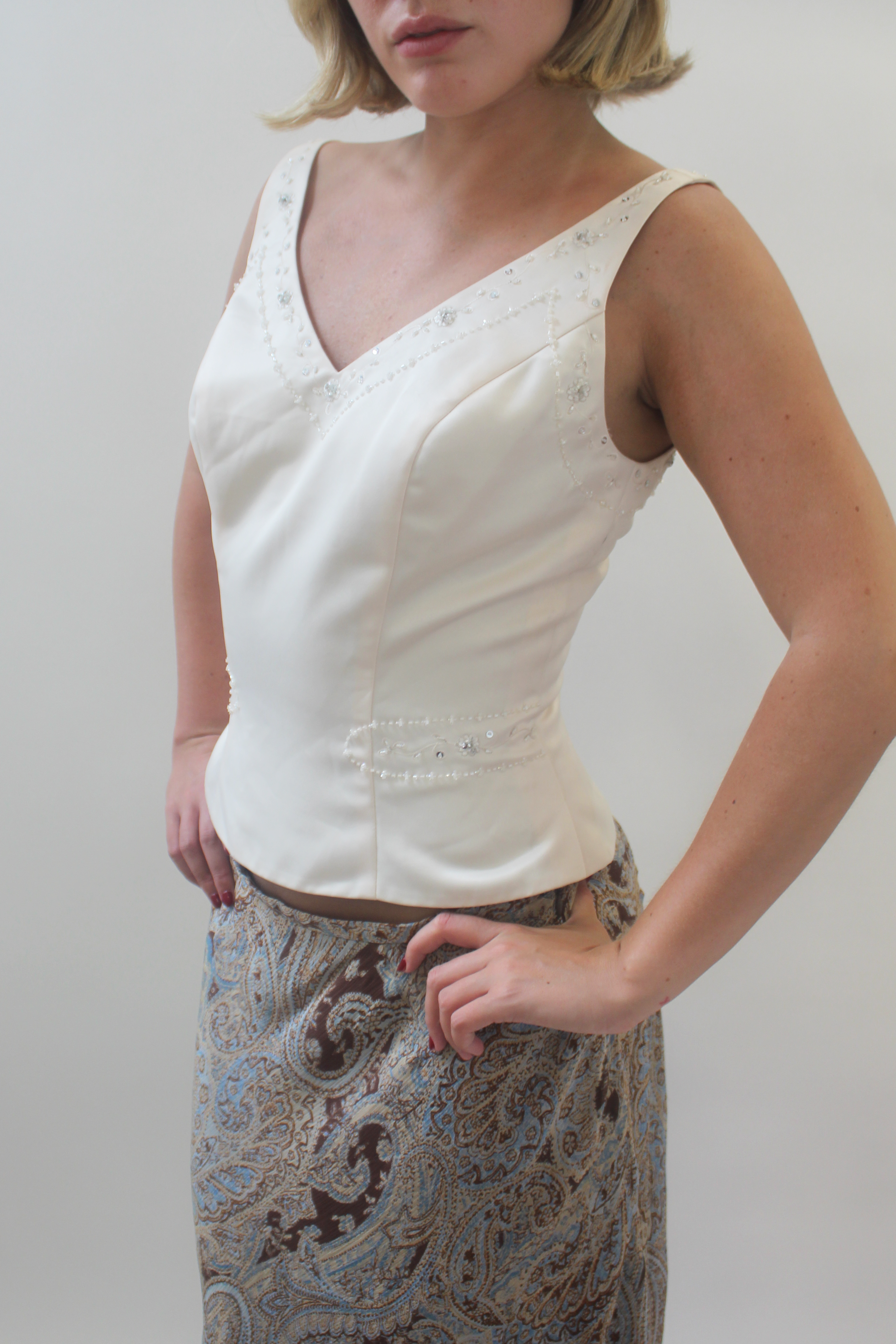 Cream top with beaded details